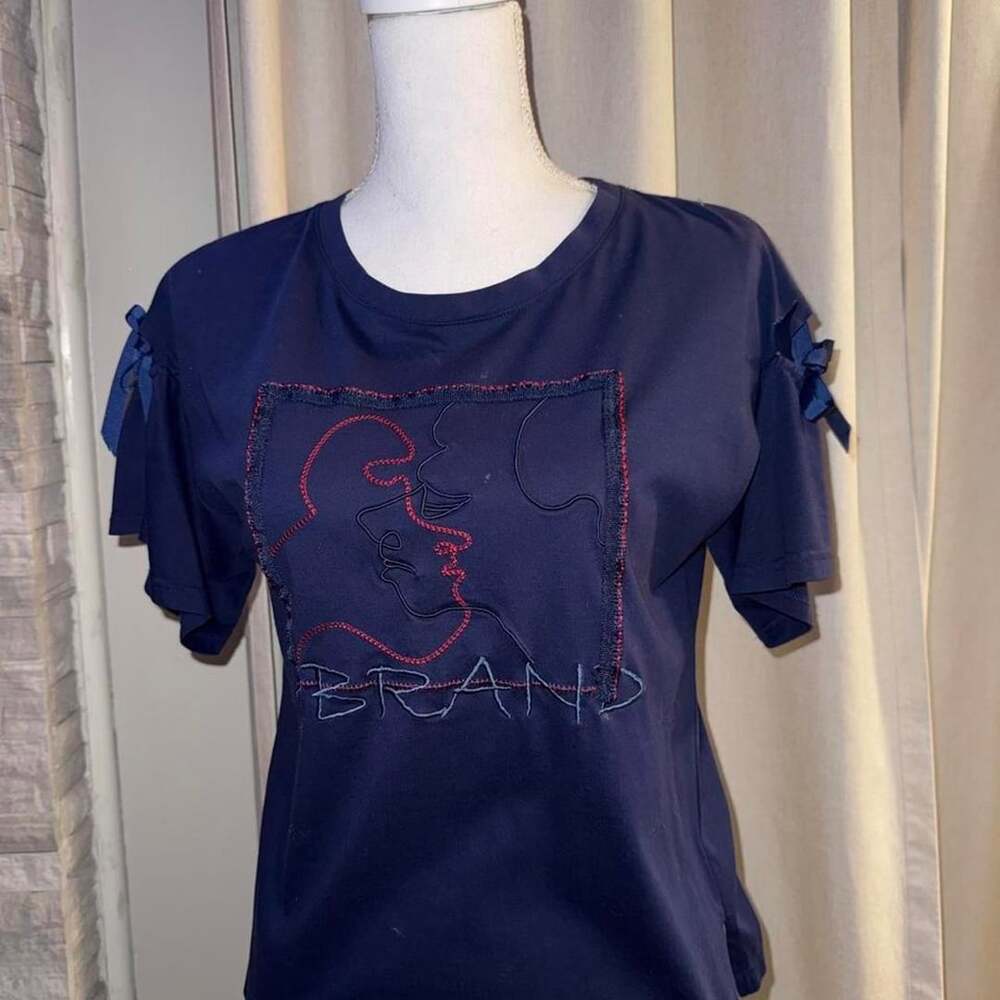 Abstract Face Embroidered Cutout Bow Sleeve Top Navy Blue